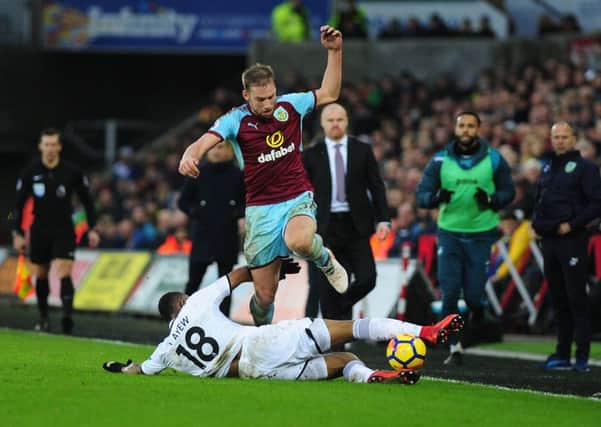 Burnley's Charlie Taylor is tackled by Swansea City's Jordan Ayew

Photographer Ashley Crowden/CameraSport

The Premier League - Swansea City v Burnley - Saturday 10th February 2018 - Liberty Stadium - Swansea

World Copyright Â© 2018 CameraSport. All rights reserved. 43 Linden Ave. Countesthorpe. Leicester. England. LE8 5PG - Tel: +44 (0) 116 277 4147 - admin@camerasport.com - www.camerasport.com