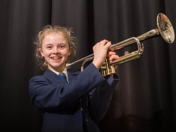 Talented cornet player Poppy Simmons wowed the audience at an expressive arts evening at her school.