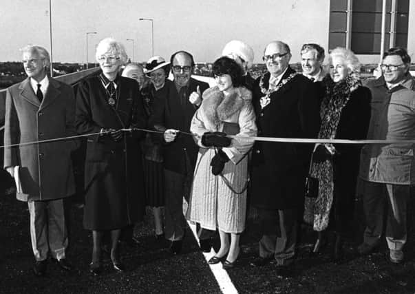 Blackpool link road, watched by civic officials in 1986. The road follows the old railway line to the site of Central Station and is named after Lancashire County Council surveyor Harry Yeadon (far left), it was opened on the 3rd January 1986. Louise Ellman in light coloured coat
