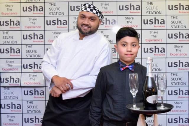 Ibby Ali with his son, Adnan