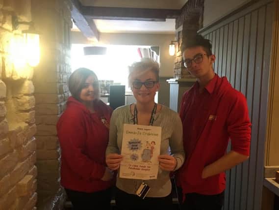 Emma-Jo Crabtree (centre) is all set for her charity headshave for Pendleside Hospice with her friends and colleagues Alex Pemberton and Lucy Baker.