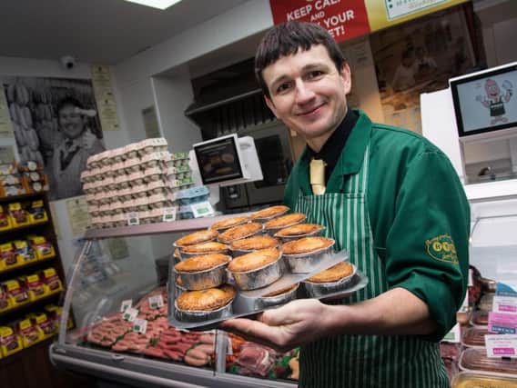 Butcher Daniel Heys with the famous pies, named in the top five in Lancashire by the Lancashire Pork Pie Appreciation Society.