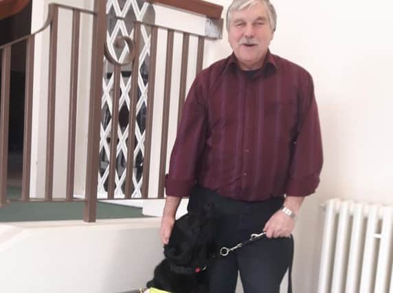 After going blind, Chris Tattersall discovered a new lease of life thanks to guide dog Goughy. (s)