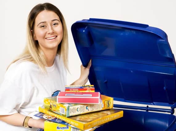 Pendle Council employee Samantha Wilkinson with the blue bin