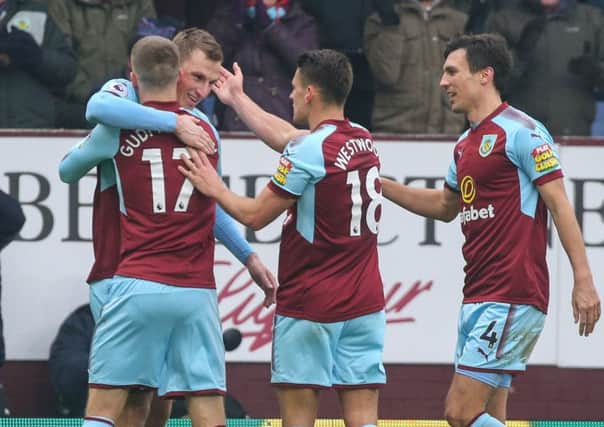 Burnley's Chris Wood celebrates scoring his side's second goal with teammates Johann Gudmundsson, Ashley Westwood and Jack CorkPhotographer Alex Dodd/CameraSportThe Premier League - Burnley v Everton - Saturday 3rd March 2018 - Turf Moor - BurnleyWorld Copyright Â© 2018 CameraSport. All rights reserved. 43 Linden Ave. Countesthorpe. Leicester. England. LE8 5PG - Tel: +44 (0) 116 277 4147 - admin@camerasport.com - www.camerasport.com