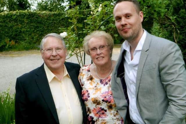 Ken and Muriel with their son, Wesley.