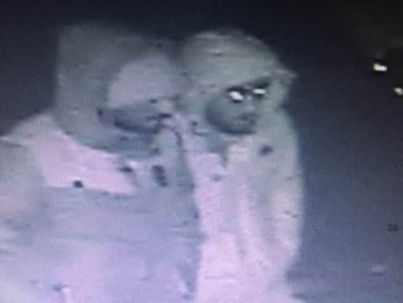 Two of the suspects captured on CCTV