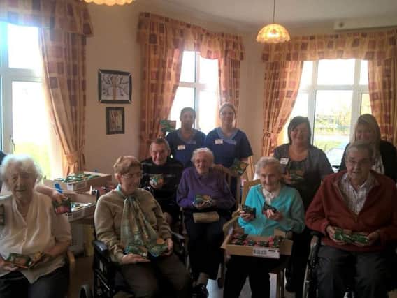 Staff and residents at Lower Ridge enjoy their pies
