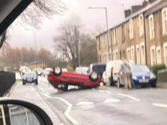 The car on its roof in Gannow Lane