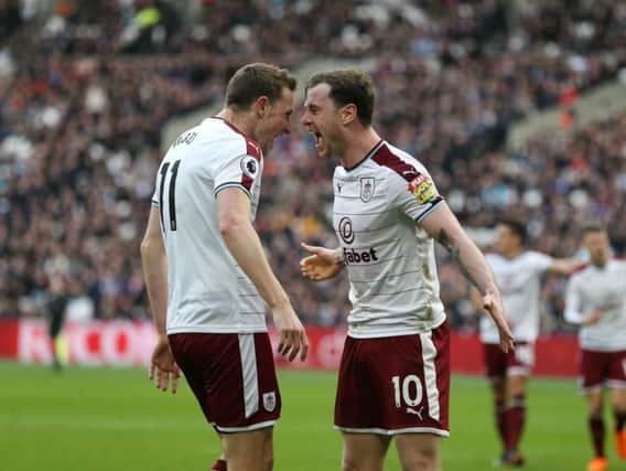 Burnley's Ashley Barnes celebrates scoring his side's first goal with Chris Wood