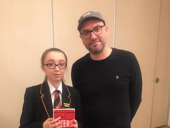 Emily Colton, from Shuttleworth College, meets author Martin Griffin at the We Are Reading launch day.