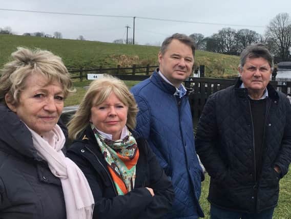 Linda and Chris McCreadie (centre) with neighbours Sally and Nigel Harris at Greenberfield Locks