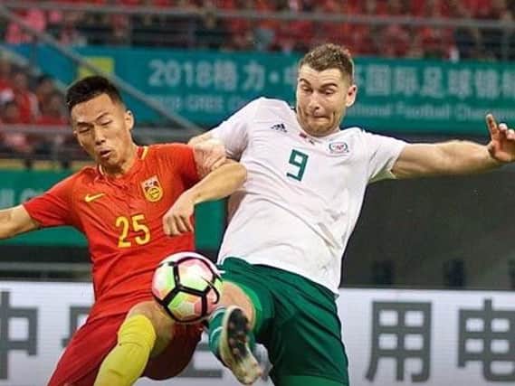 Sam Vokes scores his first goal against China