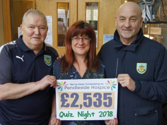 Peter, Terri and James with their cheque for Pendleside Hospice.