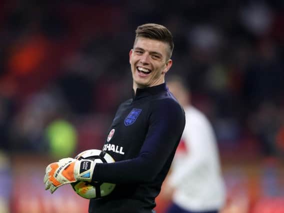 England goalkeeper Nick Pope share a joke during the international friendly match at the Amsterdam ArenA.