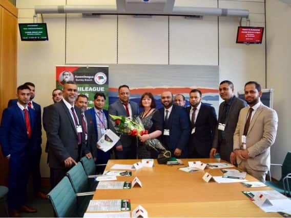 Members of Burnley Awami League and charity Burnley Generous Hands with Burnley MP Julie Cooper (s)