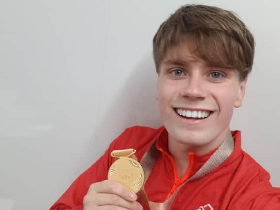 Tom Hamer won gold in theS14 200m freestyle in Australia.