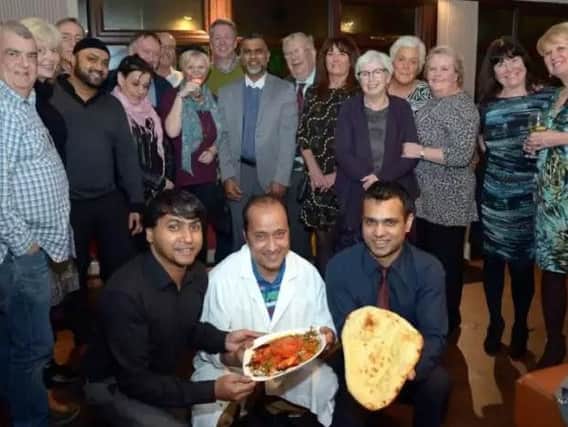 Guests and Usha Restaurant staff at the Emmaus charity curry evening last year