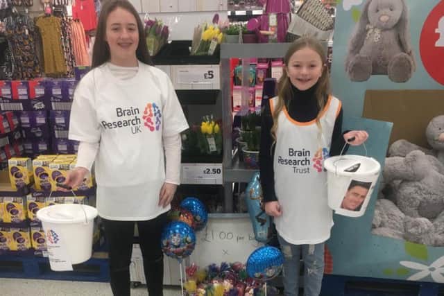 Keira's other two daughters, Chloe (left) and Missy also helped out with the fundraising.