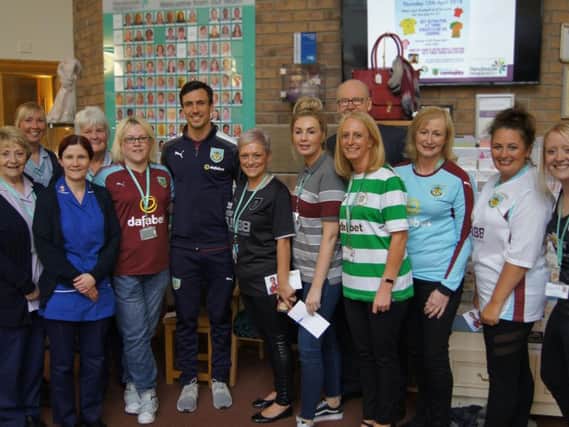 Jack Cork with Pendleside Hospice staff