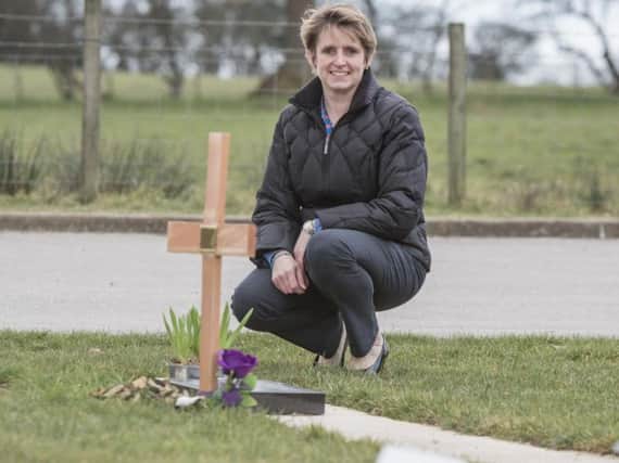 Ribble Valley Borough Council cemeteries officer Liz Nash at Clitheroe Cemeterys new ashes beam.