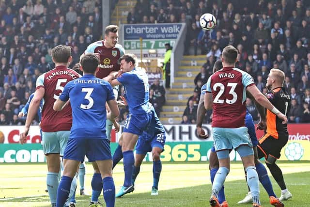Kevin Long heads his first league goal for the Clarets to double the lead