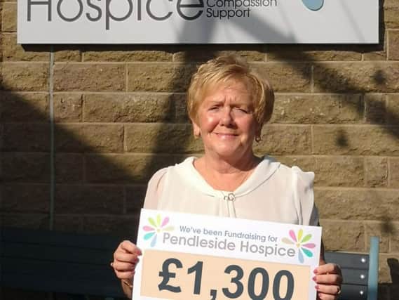 Jackie Johnson raised 1,300 for Pendleside Hospice at a race night in memory of her husband Harry who died last year.