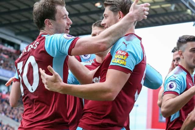 Ashley Barnes celebrates his leveller with James Tarkowski