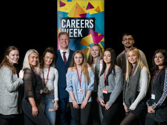 The Apprentice star Adam Corbally with some of the students from Burnley College Sixth Form Centre during their careers week.