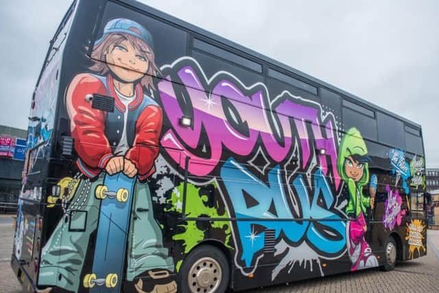 The Space Youth Bus is kitted out with Xboxes, iPads, computers and TVs to keep children entertained and safe indoors. (s)