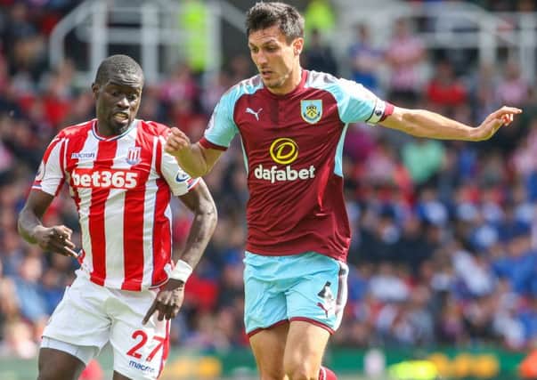 Burnley's Jack Cork gets away from Stoke City's Papa Alioune Ndiaye

Photographer Alex Dodd/CameraSport

The Premier League - Stoke City v Burnley - Sunday 22nd April 2018 - Britannia Stadium - Stoke-on-Trent

World Copyright Â© 2018 CameraSport. All rights reserved. 43 Linden Ave. Countesthorpe. Leicester. England. LE8 5PG - Tel: +44 (0) 116 277 4147 - admin@camerasport.com - www.camerasport.com