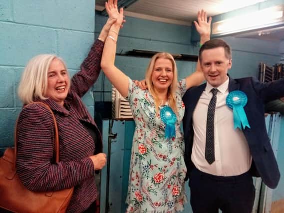 Victorious Vivary Bridge Tory candidate Victoria Fletcher (centre) with leader Coun. Paul White and mum Ann Padgett