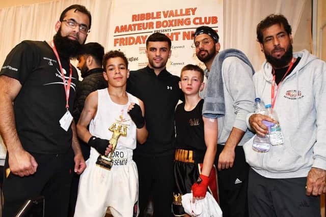 Best Club Boxer of the Night Award went to Toro Croft Senior. Pictured, from right, are Saf (head coach), Ihsan (coach), Will Williams (Jennings ABC), Jack Catterall, Toro Croft Senior (Ribble Valley ABC) and Taj (coach)