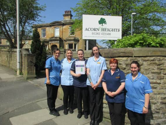 Staff at Acorn Heights Care Home in Burnley celebrate being rated good across the board by the Care Quality Commission.