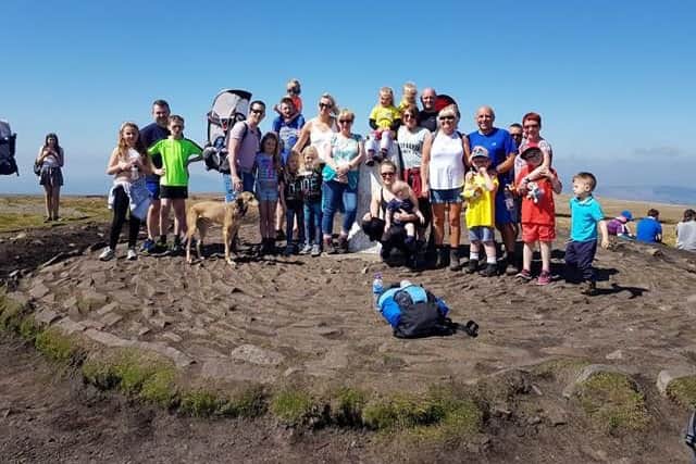 Family and friends joined Daisy for her 26th walk up Pendle Hill to raise money for Pendleside Hospice