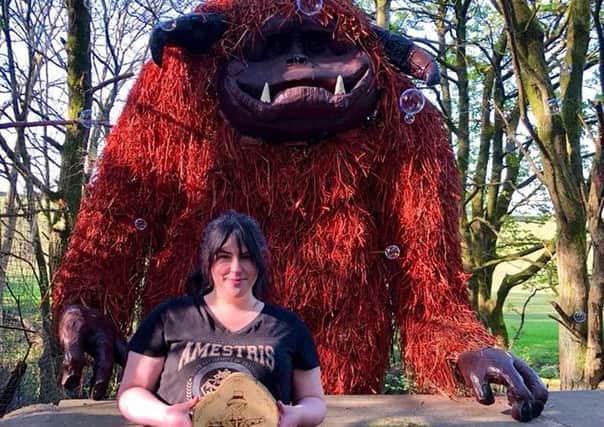 Ludo from the film The Labyrinth pictured here with his creator Hannah Kobayashi.