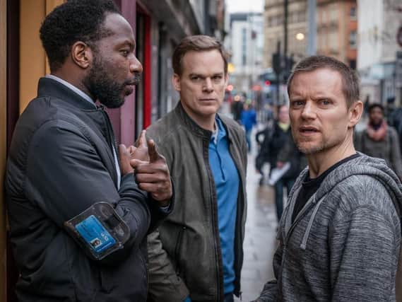 Michael C Hall (centre) and Marc Warren (right) star in Safe