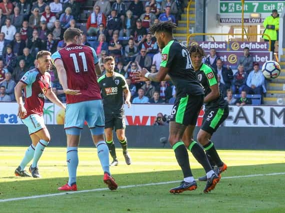 Ashley Wood's shot deflected off Chris Wood to give the Clarets the lead at Turf Moor