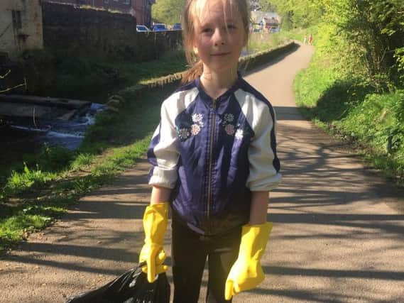 Lily Rigg takes a breather from her litter pick campaign
