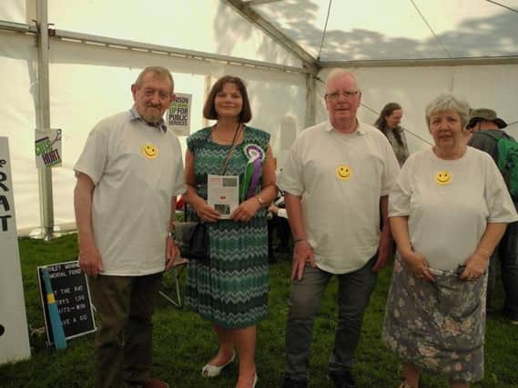 Burnley Mining Memorial Fund committee members Phil Glover (far left), Jack Nadin (second from right), and Elsie Manning (far right) with Julie Cooper MP.