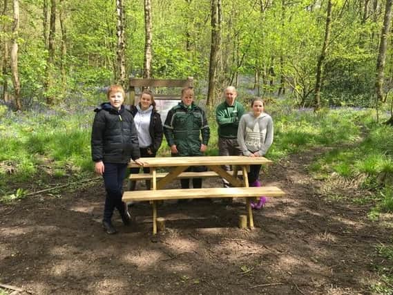 Oakhill School students with Paul Shoreman from Lancashire County Council and the new picnic bench.