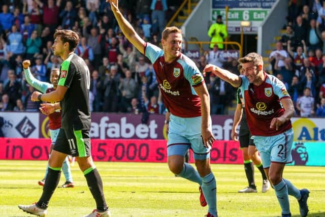 The Clarets flexed their blossoming financial muscle with the 15m acquisition of striker Chris Wood nine months ago.