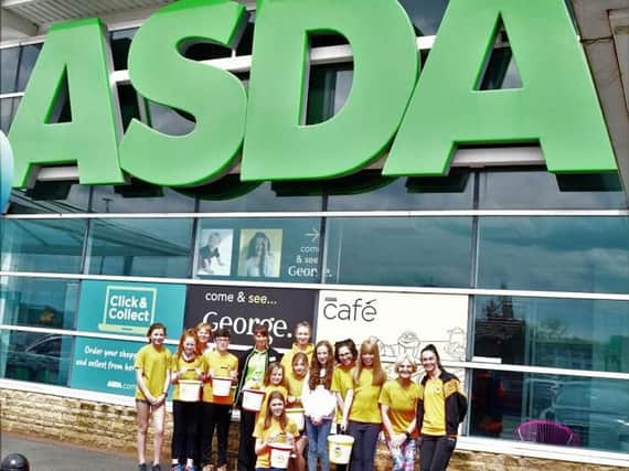 Clayton Harriers' juniors before their bag pack at the Burnley Asda store.