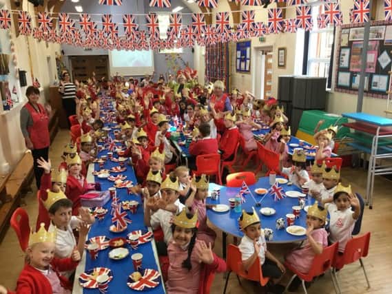 The party to celebrate the Royal Wedding gets underway at St Leonard's Primary School in Balderstone.