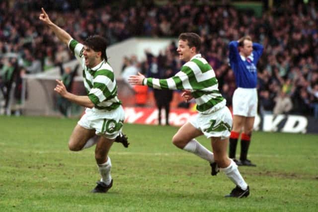 Celtic's Andy Payton (No 10) celebrates scores Celtic's second goal during a Celtic v Rangers Old Firm football match at Celtic Park in March 1993 - final score 2-1 to Celtic.
