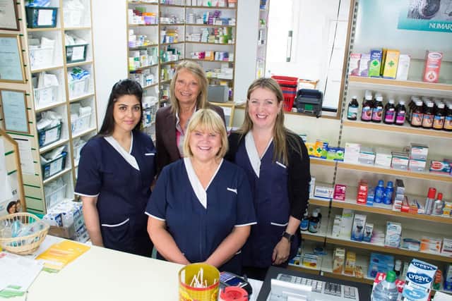 Sharon (right) with her colleagues and friends Carole Livesey (front) dispensing technician Majma Zahoor (left) and pharmacist Linda Davies
