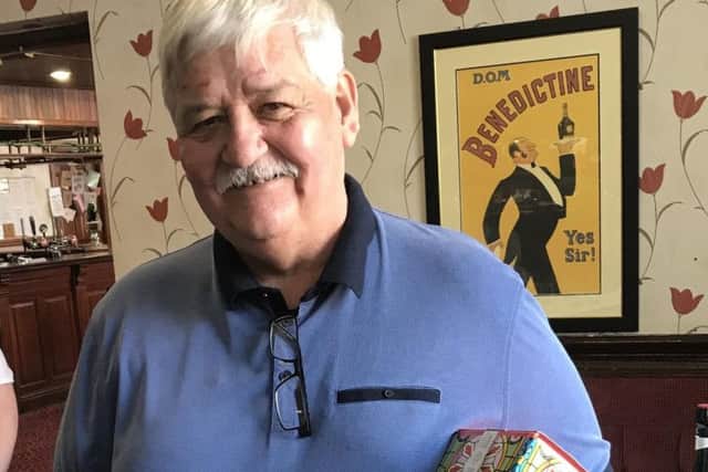 Burnley Miners' Club president Tony Mitchell was presented with a limited edition bottle, only available from Palais Bndictine as a gift from Bndictine