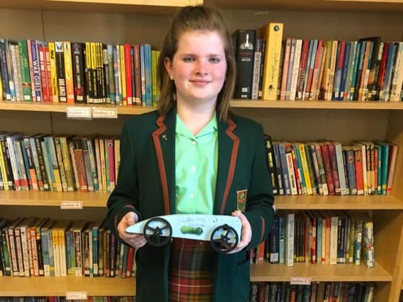 Nicole with her rocket car.