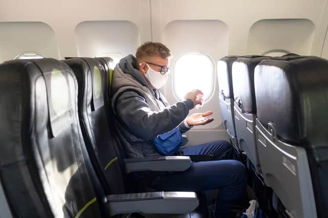 Most airlines now request that masks are worn at all times on board (Photo: Shutterstock)